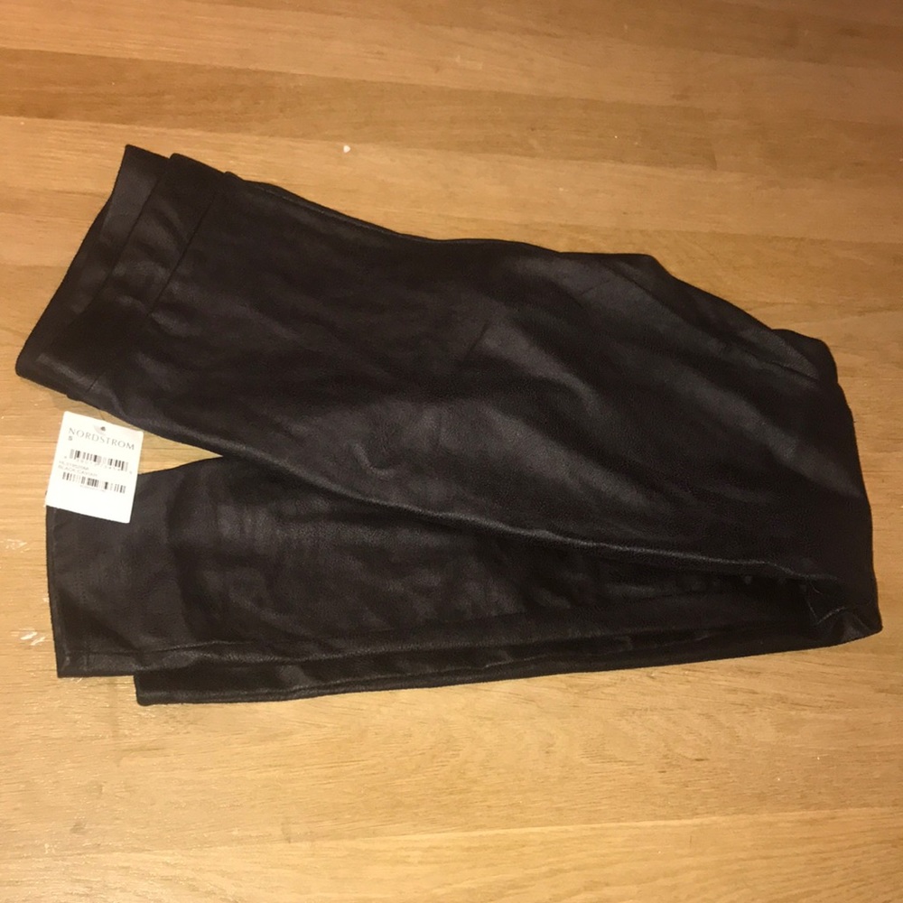 Black leather material pants